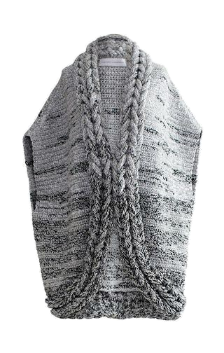 Transparent cutout of a grey sleeveless cable-knit vest